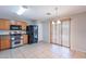 View of kitchen featuring stainless steel appliances, breakfast nook, and tile flooring at 645 W Kingman Loop, Casa Grande, AZ 85122