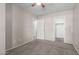 Bedroom features neutral walls, plush carpeting, and closet access at 681 W Racine Loop, Casa Grande, AZ 85122