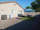 Backyard features a covered patio area with space to grill, dine, and entertain at 7118 S 37Th Gln, Phoenix, AZ 85041