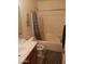 Practical bathroom with a shower-tub combo and neutral finishes at 7118 S 37Th Gln, Phoenix, AZ 85041