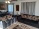 Comfortable living room with tile flooring and neutral tones at 7118 S 37Th Gln, Phoenix, AZ 85041