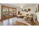 Bright living area with French doors, Saltillo floors and designer accents at 7526 E Edgemont Ave, Scottsdale, AZ 85251