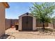 Backyard with small shed and gravel at 8012 S Magic Dr, Casa Grande, AZ 85193