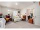 Cozy bedroom with natural light, neutral carpet, and ample space to relax or work at 8012 S Magic Dr, Casa Grande, AZ 85193