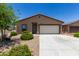 A well-maintained single-Gathering home with a two-car garage and desert landscaping is a great curb appeal at 8012 S Magic Dr, Casa Grande, AZ 85193
