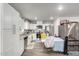 Bright kitchen with white cabinetry, granite countertops, and stainless-steel appliances at 8012 S Magic Dr, Casa Grande, AZ 85193