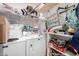 Functional laundry area with washer, dryer, shelving at 8012 S Magic Dr, Casa Grande, AZ 85193