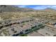 An aerial shot showcasing new home construction in a planned community nestled against scenic mountains at 812 E Summerside Rd, Phoenix, AZ 85042