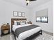 Nicely decorated bedroom with a wood headboard, plush pillows, and a modern rug at 812 E Summerside Rd, Phoenix, AZ 85042