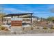 Community Expedition Park featuring a playground, benches, tables, mature vegetation, and covered seating area at 812 E Summerside Rd, Phoenix, AZ 85042