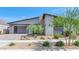 Stylish single-story home with desert landscaping and attached two car garage at 812 E Summerside Rd, Phoenix, AZ 85042