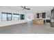 Open-concept living space adjacent to a kitchen with a stylish island at 812 E Summerside Rd, Phoenix, AZ 85042