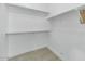Well-organized walk-in closet with ample shelving for all your storage needs at 812 E Summerside Rd, Phoenix, AZ 85042