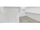 A simple walk-in closet with shelving and tile flooring at 812 E Summerside Rd, Phoenix, AZ 85042