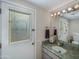 Bathroom with granite countertop and natural light at 9878 N 79Th Pl, Scottsdale, AZ 85258