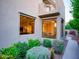 Exterior view of home showing lush landscaping and ample natural light at 9878 N 79Th Pl, Scottsdale, AZ 85258