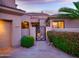 Inviting front entrance with decorative wrought iron gate and desert landscaping at 9878 N 79Th Pl, Scottsdale, AZ 85258