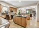 Spacious kitchen with an island, ample cabinet space, and modern appliances at 9878 N 79Th Pl, Scottsdale, AZ 85258