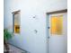 Outdoor shower setup, window, and access door at 9878 N 79Th Pl, Scottsdale, AZ 85258