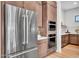 Modern kitchen featuring stainless steel appliances and custom cabinets with built in oven at 10006 E Rotation Dr, Mesa, AZ 85212