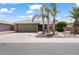 Well maintained home with desert landscaping, paved driveway and two car garage at 11025 E Nichols Ave, Mesa, AZ 85209