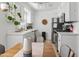 This kitchen is bright and well-maintained with white cabinets and stainless steel appliances at 1111 E Turney Ave # 3, Phoenix, AZ 85014