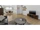Open-concept living area with a view of the dining room and kitchen, perfect for entertaining at 1111 E Turney Ave # 3, Phoenix, AZ 85014