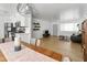 Open-concept living area with a view of the dining room and kitchen, perfect for entertaining at 1111 E Turney Ave # 3, Phoenix, AZ 85014