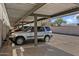 Covered parking spot featuring a silver SUV at 1111 E Turney Ave # 3, Phoenix, AZ 85014