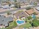 Real estate aerial view of backyard with pool, patio and house at 12639 N 47Th Ave, Glendale, AZ 85304