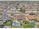 Real estate aerial view of backyard with pool, patio and house at 12639 N 47Th Ave, Glendale, AZ 85304