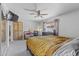 Spacious primary bedroom featuring ample storage, natural light, and a ceiling fan at 12639 N 47Th Ave, Glendale, AZ 85304