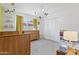 Bright and spacious bedroom, offering a cozy crib, dresser, and ample natural light at 12639 N 47Th Ave, Glendale, AZ 85304