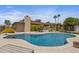 Large pool area with mature landscaping, lounge seating and backyard views at 12639 N 47Th Ave, Glendale, AZ 85304