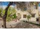 Backyard featuring patio area, desert landscaping, and shade trees at 12642 N Mountainside Dr # B, Fountain Hills, AZ 85268