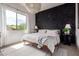 Bright bedroom featuring a modern bed, accent lighting, and view to the outside at 12642 N Mountainside Dr # B, Fountain Hills, AZ 85268