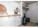 Organized closet with shelving, hanging rods, and space for storage bins and other personal items at 12642 N Mountainside Dr # B, Fountain Hills, AZ 85268