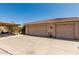 Spacious garage with ample parking, featuring a covered area for extra storage and workspace at 12837 N 68Th St, Scottsdale, AZ 85254