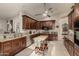 Well-equipped kitchen with granite countertops, stainless steel appliances, and ample cabinet space at 12837 N 68Th St, Scottsdale, AZ 85254