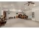 Spacious main bedroom with a ceiling fan, neutral carpet, and ample natural light, creating a serene retreat at 12837 N 68Th St, Scottsdale, AZ 85254