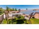 Inviting rooftop deck with seating and artificial grass, offering a perfect space for outdoor relaxation and entertainment at 12837 N 68Th St, Scottsdale, AZ 85254