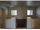 Bright hallway with dark wood floors and white paint at 14376 W Desert Hills Dr, Surprise, AZ 85379