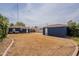 Expansive backyard showcasing well-maintained landscaping and outdoor buildings at 1622 N 17Th Ave, Phoenix, AZ 85007