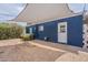 Charming backyard with shade, landscaping, and ample gravel at 1622 N 17Th Ave, Phoenix, AZ 85007