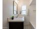 Bathroom vanity with decorative mirror and patterned flooring at 1622 N 17Th Ave, Phoenix, AZ 85007