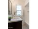 Bathroom vanity with decorative mirror and patterned flooring at 1622 N 17Th Ave, Phoenix, AZ 85007
