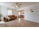 Bright living room with wood-look flooring, neutral paint, ample light, and a leather couch at 1622 N 17Th Ave, Phoenix, AZ 85007