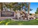 Arizona Traditions community sign and water feature at entrance on a sunny day at 18226 W Stinson Dr, Surprise, AZ 85374