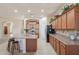 Bright kitchen with large island, updated appliances, and generous cabinet space, perfect for cooking and entertaining at 18226 W Stinson Dr, Surprise, AZ 85374