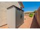 Durable outdoor storage shed provides space for organizing tools and equipment in the backyard at 18226 W Stinson Dr, Surprise, AZ 85374